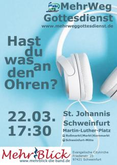 weiße Kopfhörer auf blauem Grund